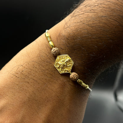 Yellow Gold Ganpati Rakhi with Rudraksh