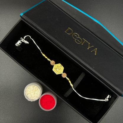 Yellow Gold Ganpati Rakhi with Rudraksh